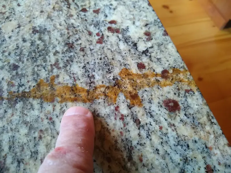 Does Granite Stain? Understanding the Risks, Prevention & Solution
