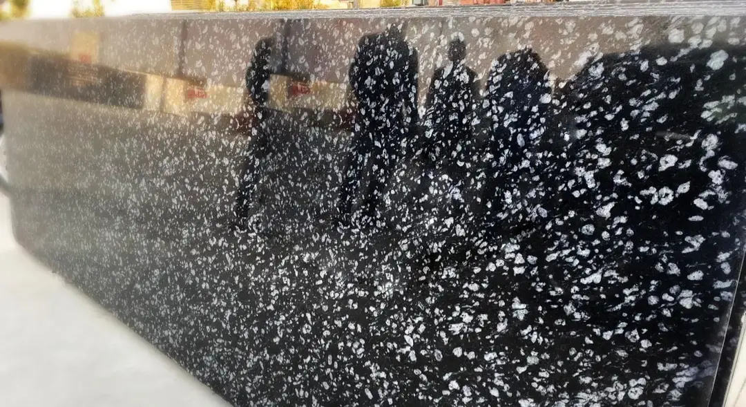 Coin Black granite polished finish