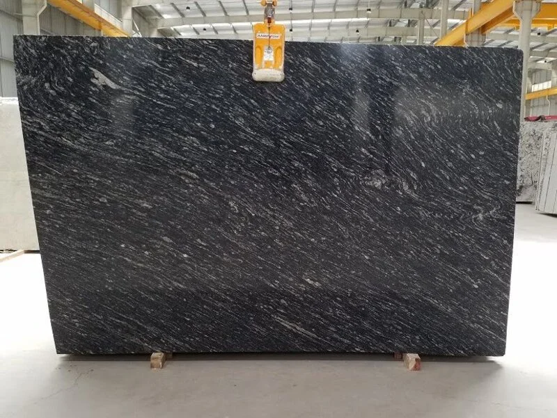 Markino Black Granite: Natural stone with bold white and grey veining across a deep black base—perfect for modern kitchens, bathrooms, and accent walls.